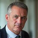 Headshot of Michael P., a thoughtful 49-year-old man